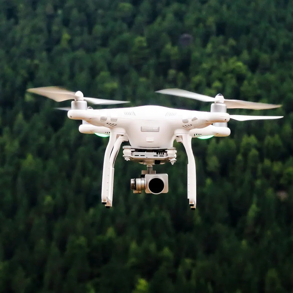 Northgate Lark Mini camera drone in flight with its gimbal camera visible